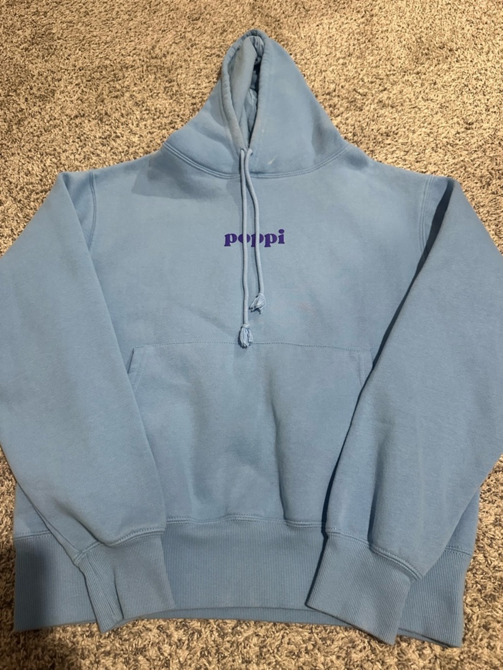 poppi Light Blue Pullover Hoodie with Purple Logo